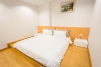Postel nebo postele na pokoji v ubytování Klongrien Boutique Hotel