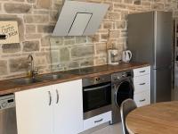 Kuchyňa alebo kuchynka v ubytovaní VILLA SELINI LUXURY APARTMENT