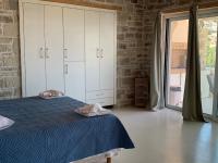 Posteľ alebo postele v izbe v ubytovaní VILLA SELINI LUXURY APARTMENT