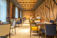 Posezení v ubytování Royal Plus Hotel