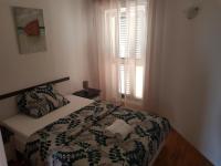 Postel nebo postele na pokoji v ubytování Apartment Doris