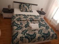 Postel nebo postele na pokoji v ubytování Apartment Doris