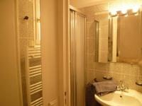a bathroom with a sink and a mirror at Palais Augusta- CAT3615- 2Bedrooms in Cannes