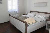 Postel nebo postele na pokoji v ubytování Penzion-apartmán Souček