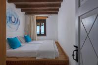 Posteľ alebo postele v izbe v ubytovaní Aquavisionaire Beach Front Villa