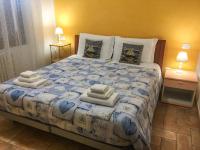 A bed or beds in a room at B&B Villa Sophie