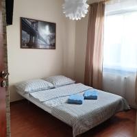 Łóżko lub łóżka w pokoju w obiekcie Apartament Sloneczny Taras