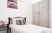 Posteľ alebo postele v izbe v ubytovaní Stavros Villas&Apartments