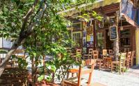 A restaurant or other place to eat at Stefanias sunny Acropolis Studio on Drakou pedestrian
