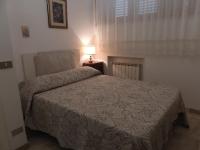 Posteľ alebo postele v izbe v ubytovaní Casa di Angela