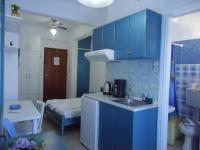 A kitchen or kitchenette at Kallithea Studios