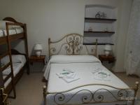 Posteľ alebo postele v izbe v ubytovaní Az. Agrituristica U'SPIGU