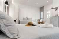 Posteľ alebo postele v izbe v ubytovaní Skalidis Apartments Stalis