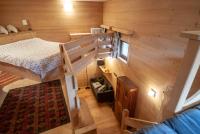 Posteľ alebo postele v izbe v ubytovaní Mountain Loft