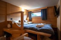 Posteľ alebo postele v izbe v ubytovaní Mountain Loft