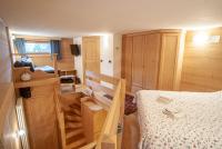 Posteľ alebo postele v izbe v ubytovaní Mountain Loft