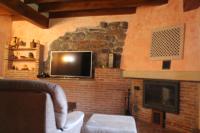 Televízia a/alebo spoločenská miestnosť v ubytovaní Casa Rural Reserva Saja-Besaya