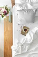Posteľ alebo postele v izbe v ubytovaní Daios Luxury Living