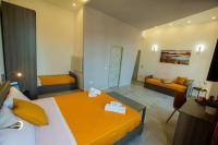 A bed or beds in a room at Bayard101