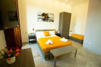 A bed or beds in a room at Bayard101