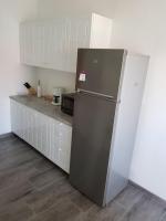 Kuchyň nebo kuchyňský kout v ubytování Apartment Doris