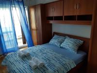 Postel nebo postele na pokoji v ubytování Apartment Doris