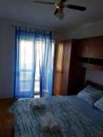 Postel nebo postele na pokoji v ubytování Apartment Doris