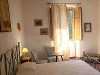 Posteľ alebo postele v izbe v ubytovaní Agriturismo Fattoria Santo Stefano