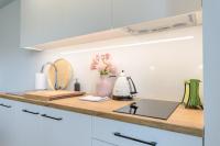 Kuchyňa alebo kuchynka v ubytovaní Perfekt Apartments 5 Mórz Sianożęty