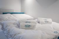 Posteľ alebo postele v izbe v ubytovaní Perfekt Apartments 5 Mórz Sianożęty