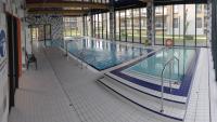 Bazén v ubytovaní Perfekt Apartments 5 Mórz Sianożęty alebo v jeho blízkosti
