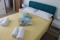 Posteľ alebo postele v izbe v ubytovaní Apartman Lapis