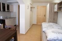 Postel nebo postele na pokoji v ubytování Penzion-apartmán Souček