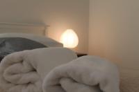 Posteľ alebo postele v izbe v ubytovaní Apartman Lapis