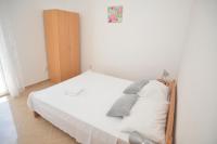 Postel nebo postele na pokoji v ubytování Apartments Lavanda