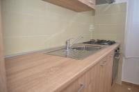 Kuchyň nebo kuchyňský kout v ubytování Apartments Lavanda