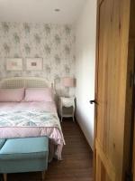 Cama o camas de una habitación en El Cuartel del Rio Dulce