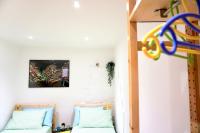 Łóżko lub łóżka w pokoju w obiekcie Otello Apartment
