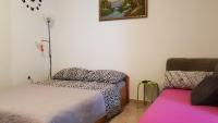 Postel nebo postele na pokoji v ubytování Apartment Gobov