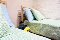 Łóżko lub łóżka w pokoju w obiekcie Otello Apartment