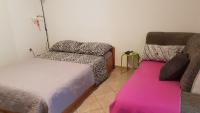 Postel nebo postele na pokoji v ubytování Apartment Gobov