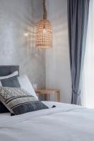 Postel nebo postele na pokoji v ubytování Oikia guesthouse
