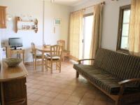 Televízia a/alebo spoločenská miestnosť v ubytovaní Apartamentos Atlantis