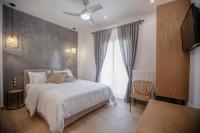 Postel nebo postele na pokoji v ubytování Oikia guesthouse