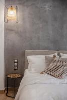 Postel nebo postele na pokoji v ubytování Oikia guesthouse