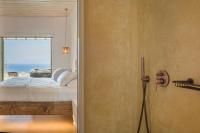 Posteľ alebo postele v izbe v ubytovaní KLIDON Dreamy Living Suites