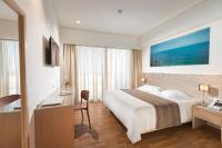 Posteľ alebo postele v izbe v ubytovaní Alexandra Hotel&Apartments