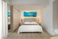 Posteľ alebo postele v izbe v ubytovaní Alexandra Hotel&Apartments