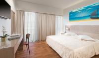 Posteľ alebo postele v izbe v ubytovaní Alexandra Hotel&Apartments
