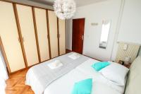 Posteľ alebo postele v izbe v ubytovaní Family Beach Apartments